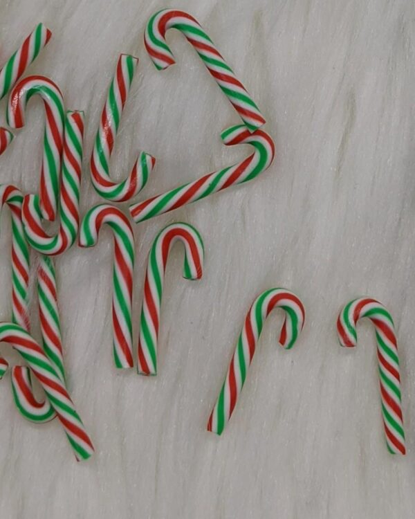 A white sheet with candy canes on it