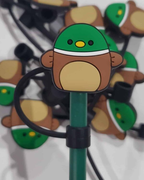 A close up of a bunch of green and brown monkey shaped lights