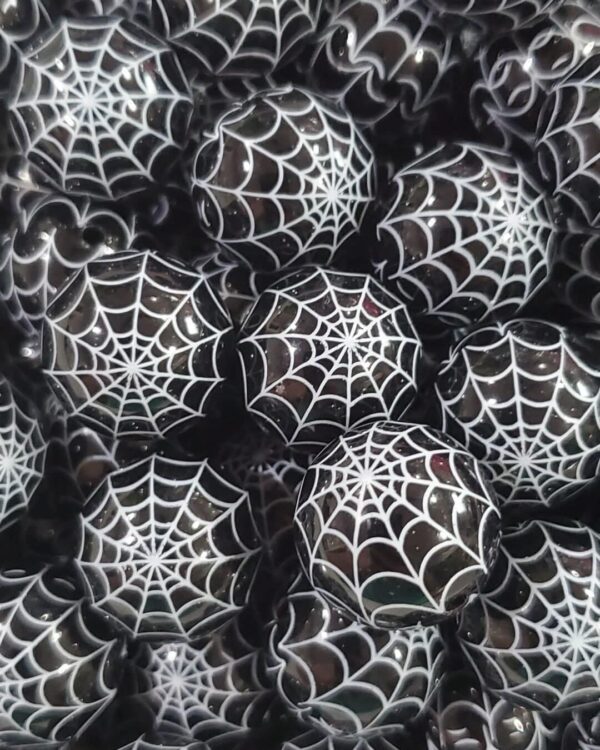 A pile of black and white spider webs.