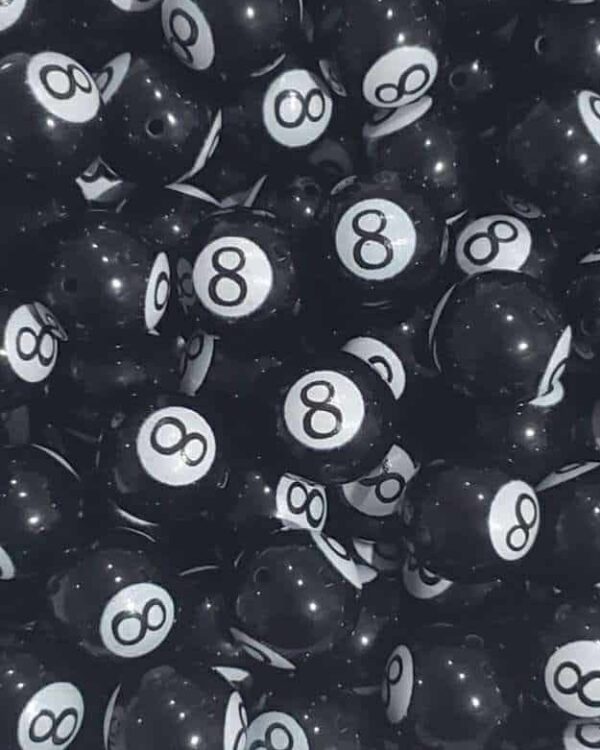 A pile of black and white balls with numbers 8.